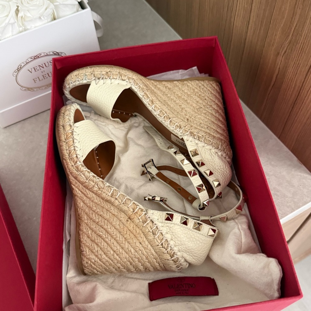 Valentino Garavani
Cream Rockstud Double Espadrille Wedge Sandals